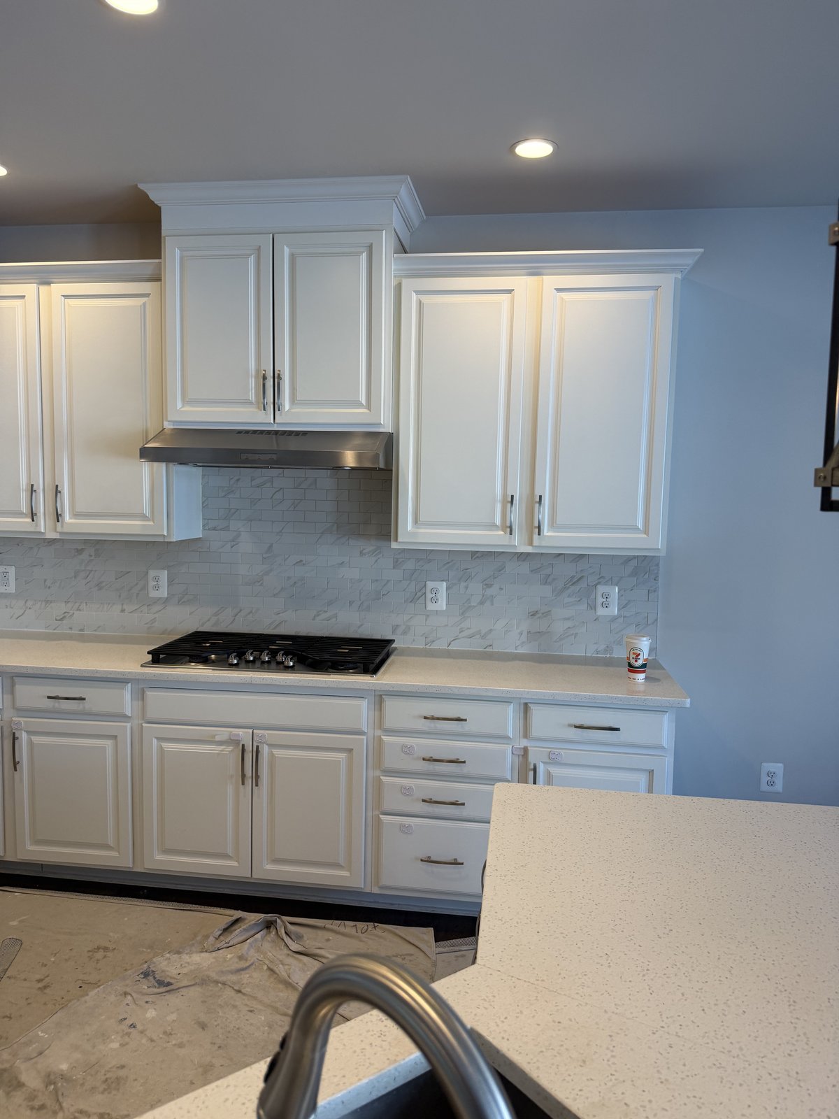 Kitchen in progress - cabinets and backsplash installation